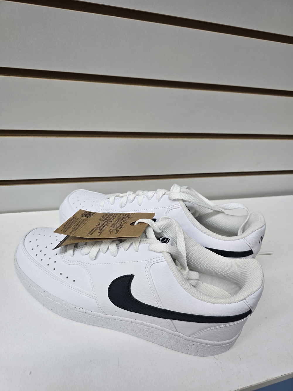 Nike White Sneakers with Black Swoosh Low-Top